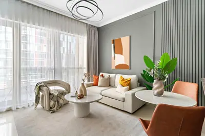 a living room with a couch and a table at Silkhaus Dubai Marina 1BR in Bay Central West Tower in Dubai