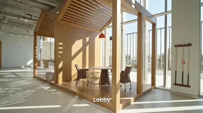 a dining area with a table and chairs in a building at Cosy 1 bed Apt in Dubai Hills in Dubai