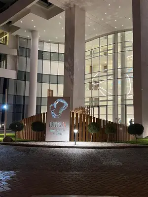 a building with a sign in front of it at Cozy Home with Beach Access in Palm Jumeirah in Dubai