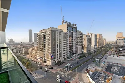 an aerial view of a city with tall buildings at FIRST CLASS 1BR Cozy Urban Getaway in Dubai