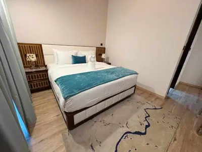 a bedroom with a large bed in a room at Holiday Homes by DO - Dubai Marina in Dubai