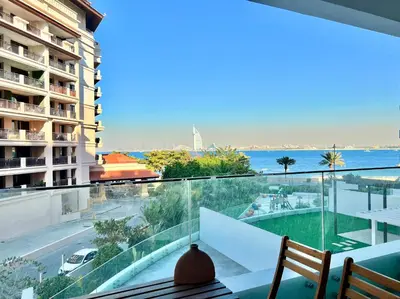 a view of the ocean from a balcony of a building at Azizi Mina - Palm Jumeirah in Dubai