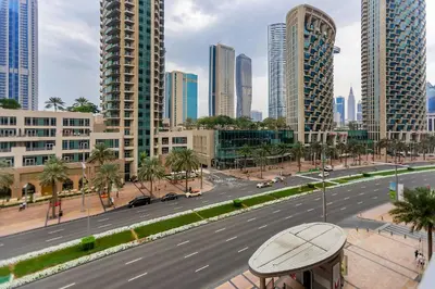 a view of a city street with tall buildings at Modern Stylish Studio Apartment next to Burj Khalifa walk into Dubai mall in Dubai