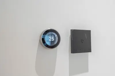 a clock is hanging on a wall at Elegant 1BHK by CzechIn Luxe Stay with Pool and Gym in Dubai