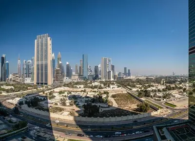 a view of a city with tall buildings at Elegant 2BR by Dubai Mall in Dubai