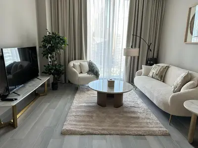 a living room with a couch and a coffee table at Entire apartment in Dubai Marina in Dubai