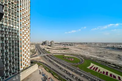 a view of a city from a tall building at FIRST CLASS 1BR Elegant Modern Retreat in Dubai