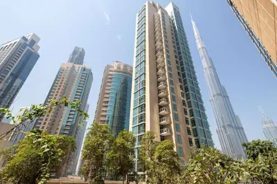 a group of tall buildings in a city at Frank Porter - The Residences 5 in Dubai