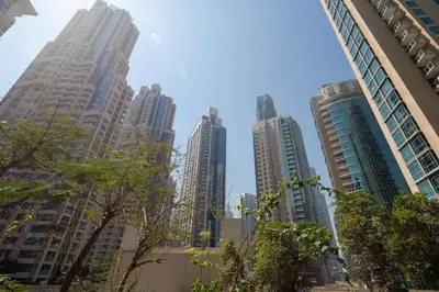 a group of tall buildings in a city at Frank Porter - The Residences 5 in Dubai