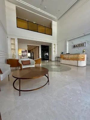 a lobby with a coffee table and a living room at Azizi Riviera 43 in Dubai