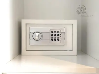 a white microwave with a control panel on a wall at Nomad Retreats- Silverene tower Marina view in Dubai