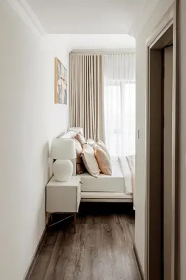 a white bed in a room with a window at Beautiful 3 bed In Dubai Marina! in Dubai