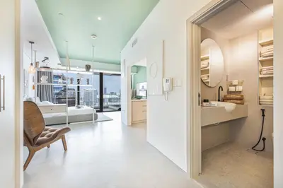 a bathroom with a sink and a mirror at Premium & Cozy Home in the Heart of Sports City in Dubai