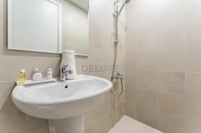 a bathroom with a sink and a shower at 2BR with Balcony, Exclusive Amenities and Steps from Iconic Landmarks, Madinat Jumeirah Living Rahaal 2, Jumeirah in Dubai