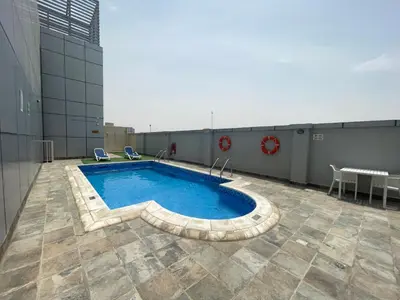 a swimming pool on the roof of a building at Ultra Luxury Chic 2Bed in Dubai in Dubai