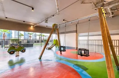 a play room with swings and a playground at 1BDR with Burj Khalifa Views in Elite Downtown in Dubai