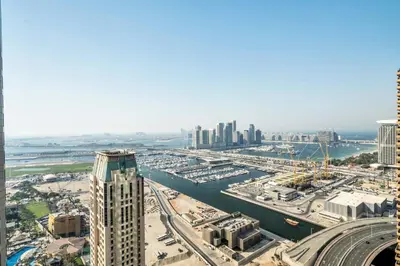 an aerial view of a city with a river and buildings at GuestReady - Fantastic retreat with Palm views in Dubai