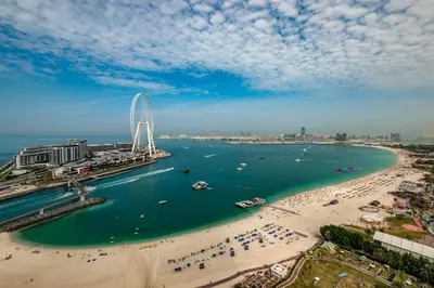 an aerial view of a beach with a ferris wheel at Short Stay Apartment Shams 1 Jumeirah Beach Residence 2 Bed Sleeps 6 - DVH HOLIDAY HOMES in Dubai