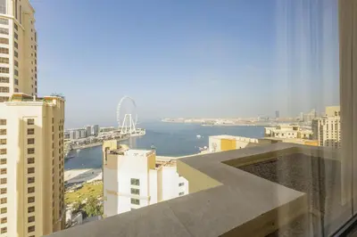 a view of the ocean from a building at Short Stay Apartment Shams 1 Jumeirah Beach Residence 2 Bed Sleeps 6 - DVH HOLIDAY HOMES in Dubai