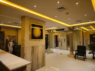 a lobby of a hotel with a picture on the wall at Al Manara Premium Deluxe Sheikh Zayed View Studio in Dubai