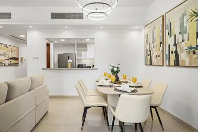 a dining room with a table and chairs at Standpoint Tower by Luxe Living in Dubai