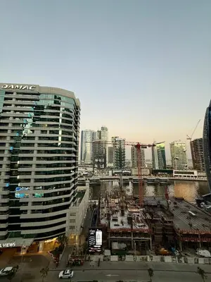 an aerial view of a city with buildings at DAMAC Reva 5 mins Walk from Dubai mall in Dubai