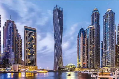 a group of tall buildings in a large city at Livbnb-Spacious 2 BR in Dubai Marina with Balcony in Dubai