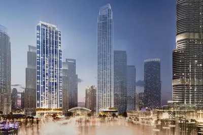 a view of a city with a fountain and buildings at Livbnb-Modern 2BR with Partial Burj Khalifa View in Dubai