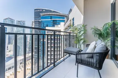 a balcony with a view of a city at City Views 1BR with Balcony Near Dubai Water Canal, Zada Tower, Business Bay by Deluxe Holiday Homes in Dubai