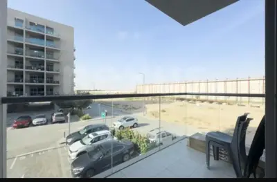 a view of a parking lot from a balcony at B&B retro in Dubai