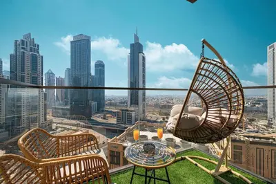 a room with a hammock on the top of a building at Mahogany 7 - 2BR 6PAX - Walk to Burj & Dubai Mall in Dubai