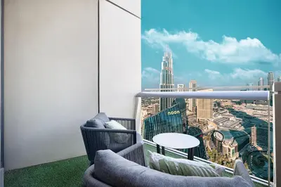 a balcony with a view of a city at 4BR Luxury Apartment with Burj Khalifa View and Direct Dubai Mall Access - Pool and PS5 Included in Dubai