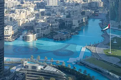 an aerial view of a river in a city at 4BR Luxury Apartment with Burj Khalifa View and Direct Dubai Mall Access - Pool and PS5 Included in Dubai