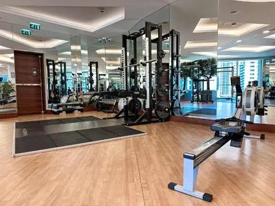 a gym with exercise equipment in a building at Cinematic View Studio - Emaar Residences in Dubai