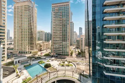 an aerial view of a city with tall buildings at Luxury Studio in Dubai Marina with Canal views in Dubai