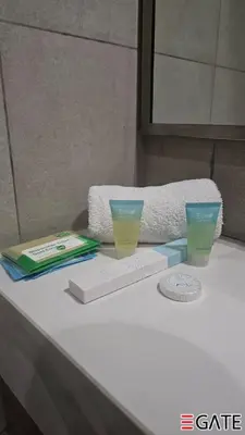 a table with two cups and books on it at EGATE - Studio - 1st Floor with Terrace - Dubai - 31-109 in Dubai