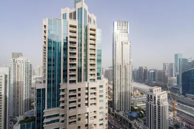 a view of a city with many tall buildings at Arabian Nights 1BR - Burj Khalifa & Fountain Views - 5 Mints Walk to Burj Khalifa and Dubai Mall in Dubai