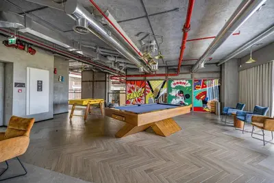 a room with a ping pong table in it at Wonderful Stay at Collective 2- Unique in Dubai Hills - 5 min to Dubai Hills Mall - Brand New Luxury Apartments in Dubai