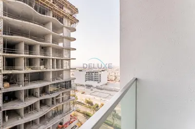 a view of a building under construction at City Views 1BR with Balcony Near Mall, Concept 7 Residences, Jumeirah Village Circle by Deluxe Holiday Homes in Dubai