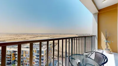 a balcony with a view of the beach at Vacationer I Exclusive 2 Bedroom I Breathtaking Skyline & City Views I Afnan 1 - IMPZ in Dubai