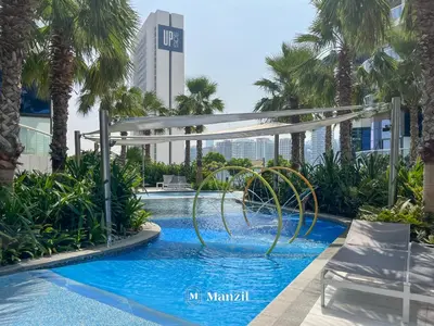 a pool at the miami marriott hotel at Luxury 1BR Apartment in Paramount Top-Floor Retreat in Dubai
