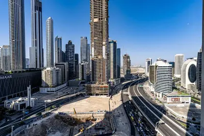 a view of a large city with tall buildings at Stylish Studio apartment in Downtown Dubai in Dubai