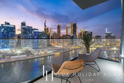 a view of a city skyline from a balcony at LUX The Modern Binghatti Canal Suite 2 in Dubai