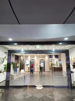 a lobby of a building with people in it at Marina Nest - Spacious one bed apt with a view in Marina, walking distance from JBR, metro & tram! in Dubai