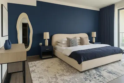 a blue bedroom with a bed and a mirror at Massive LuxXo Family & Friends Villa with Terraces, Private Parking, Pool & Quick Access to Dubai Mall in Dubai