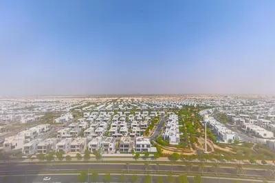 an aerial view of a large apartment complex at Cozy 1 bdr apartment with pool and beach access in Dubai