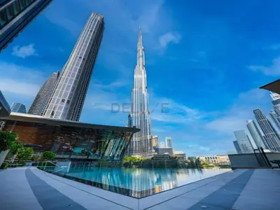 a view of the chicago city skyline from a bridge at City Vibe 1BR with Outdoor Space, Walking Distance to Burj Khalifa and Dubai Mall, Grande, Downtown Dubai by Deluxe Holiday Homes in Dubai