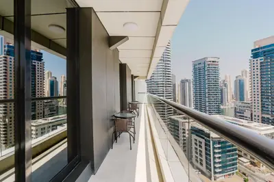 a balcony with a view of the city at RH- Heart of Dubai Marina, Sunny & bright 2 BR apartment with big balcony in Dubai