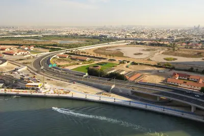 an aerial view of a bridge over the water at Stylish 2BR Apartment by Missoni near Dubai Mall in Dubai