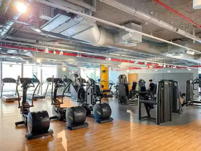 a gym with treadmills and elliptical machines at Vogue Downtown Views II with Direct Access to Dubai Mall Via a Climate Controlled Bridge, Two Bedroom Apartment with Balcony and Burj Khalifa View in Dubai